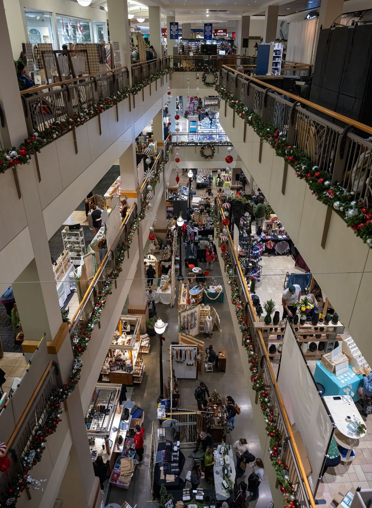 Three floors and more were filled in River Park Square with artisans Sunday in downtown Spokane for Terrain’s seventh Winter BrrrZAAR. Thousands flocked downtown this weekend for multiple holiday events, including the Historic Davenport Hotel’s Christmas Tree Elegance and the Holiday Village in the Gesa Pavilion in Riverfront Park. (COLIN MULVANY/The Spokesman-Review)