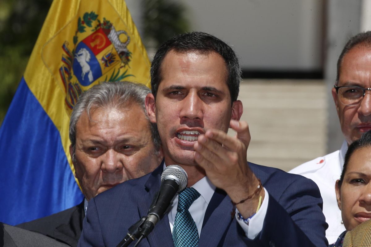 Opposition leader Juan Guaido, who has declared himself the interim president of Venezuela, speaks during a press conference on the steps of the National Assembly in Caracas, Venezuela, Monday, Feb. 4, 2019. Germany, Spain, France, the U.K. and Sweden have announced that they are recognizing Guaido as the country