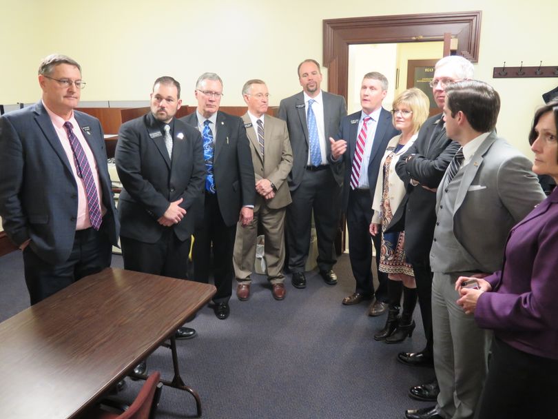 Every state representative from Canyon County gathers Wednesday in the Capitol press room to make a public statement that they won't leave this year's legislative session without a highway bill; a major, highly congested stretch of freeway through the county has badly deteriorated.  (Betsy Z. Russell)
