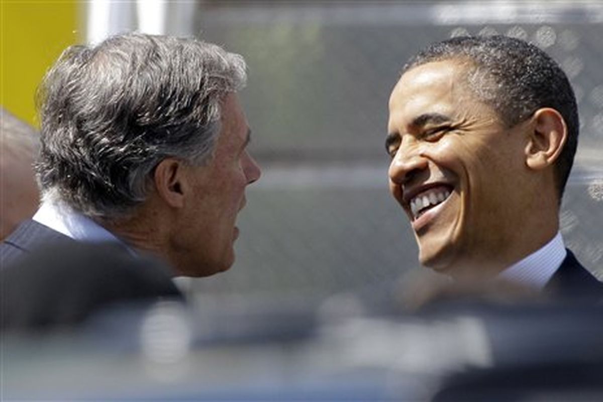 President Barack Obama greets former Washington Rep. Jay Inslee, who is currently a Democrat running for governor, after Obama arrived in Seattle, Thursday, May 10, 2012. Obama was in town for fund-raising events. (Ted S. Warren/Associated Press)