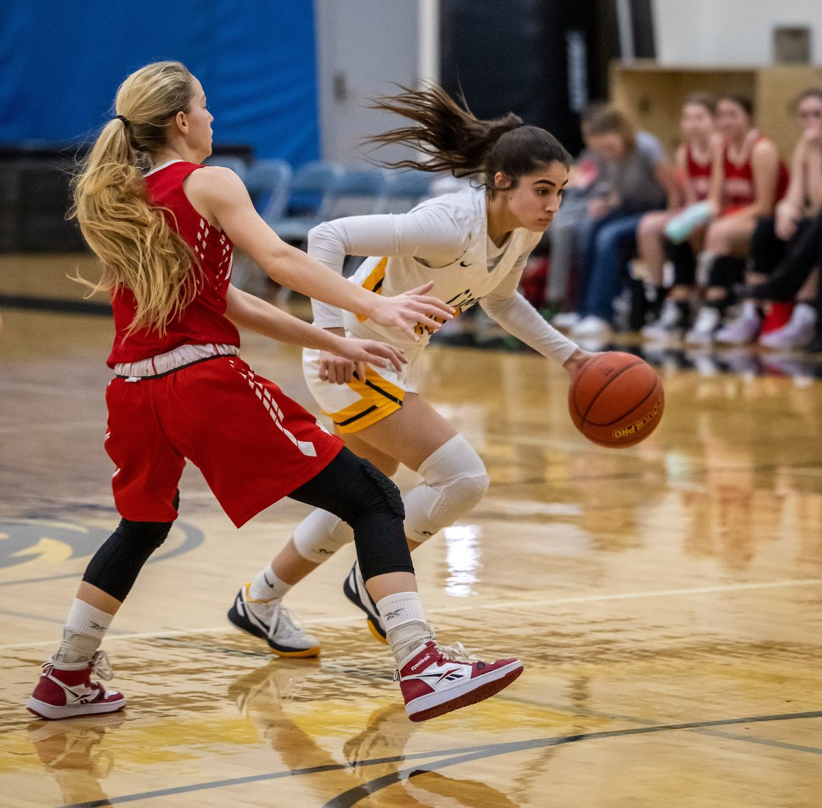 Upper Columbia Academy guard Mia Pierce drives against Davenport during a Northeast 2B League game on Jan. 18 in Spangle.  (COLIN MULVANY/THE SPOKESMAN-REVI)