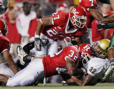 
South Florida's Carlton Williams (32) tackles Rutgers running back Ray Rice on Thursday. Associated Press
 (Associated Press / The Spokesman-Review)