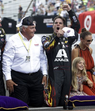 Jeff Gordon celebrates his fifth NASCAR Brickyard 400 title. (Associated Press)