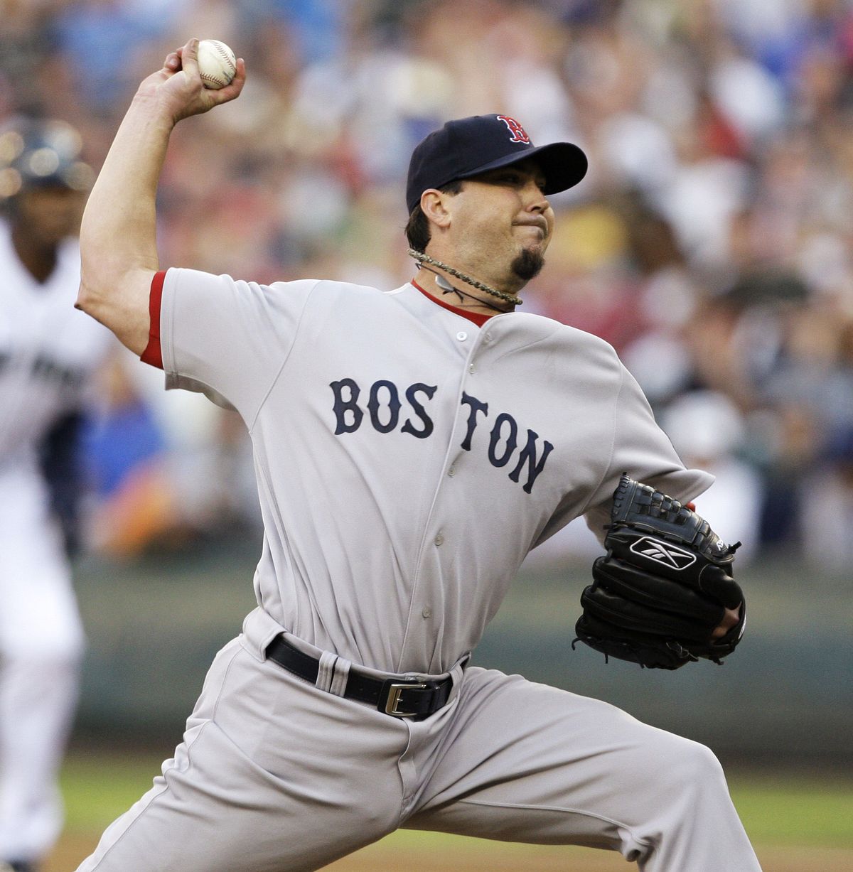 Red Sox starter Josh Beckett allowed three runs – two earned – over seven innings for his fourth win of the season. (Associated Press / The Spokesman-Review)