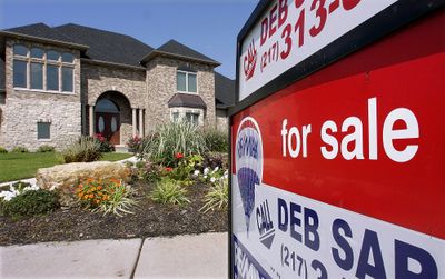 New home sales tumbled in August, while the average sales price fell by the largest amount on record, demonstrating the depth of the problem that Washington is trying to solve.   (Associated Press / The Spokesman-Review)