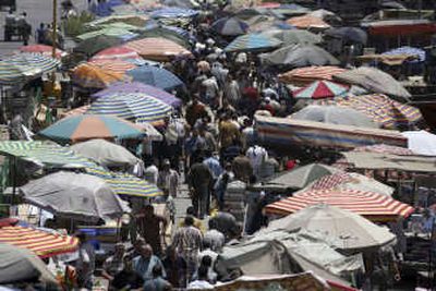 
The truce in the Shiite stronghold of Sadr City has brought a sense of relative security to Baghdad, where the central market was full of people on Thursday.Associated Press
 (Associated Press / The Spokesman-Review)