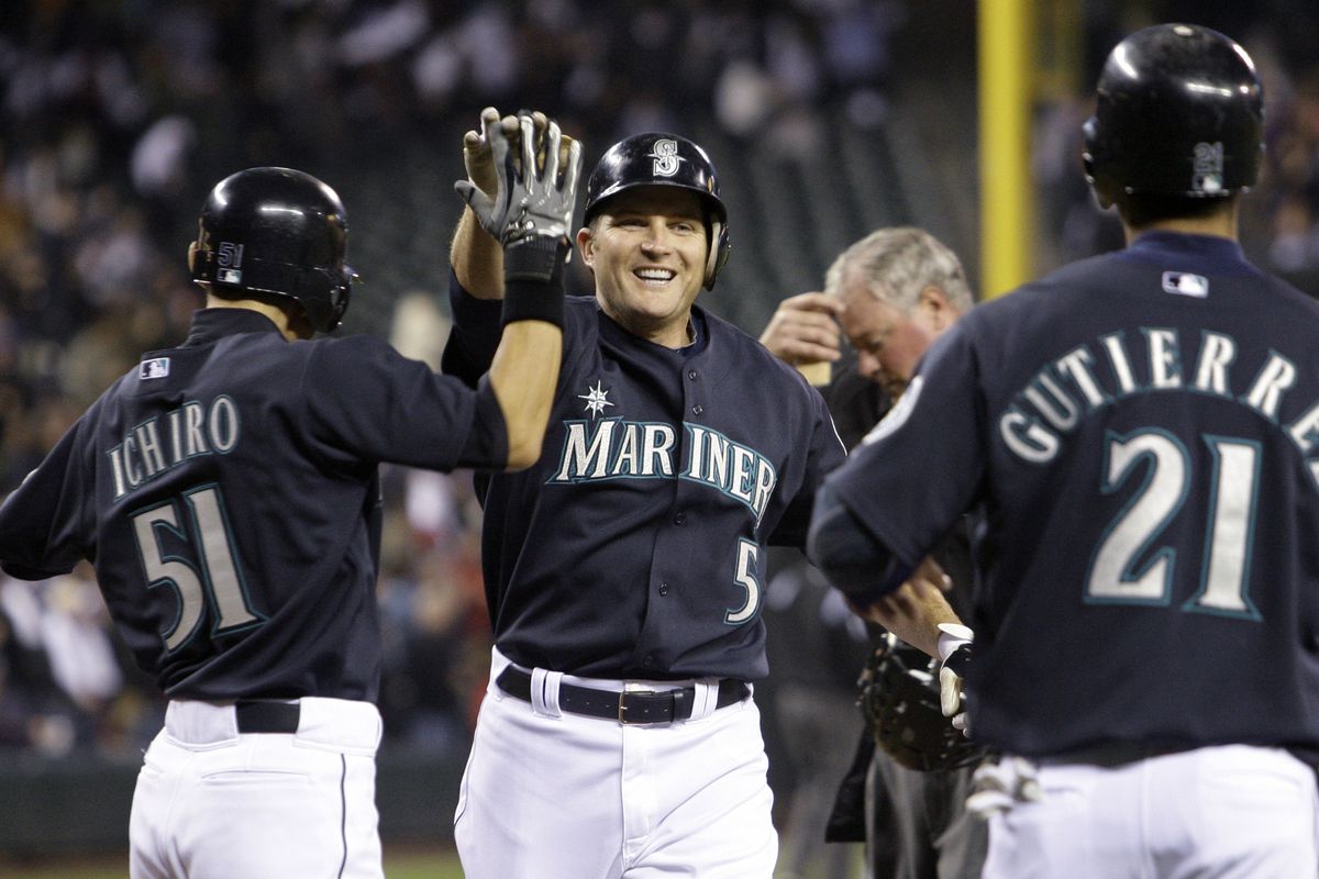 Mariners designated hitter Mike Sweeney is all smiles after hitting a three-run home run in the second inning that gave the Mariners a 7-2 lead. Sweeney went 4 for 5 with two homers and six RBIs. (Associated Press)