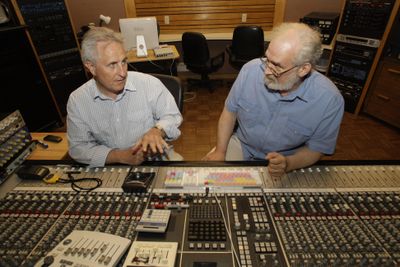 John Giaier, left, and Bill Gildenstern work at a sound mixing board during an interview at Studio A in Dearborn Heights, Mich., June 25. They  created the Rosary Tapes. (Associated Press / The Spokesman-Review)