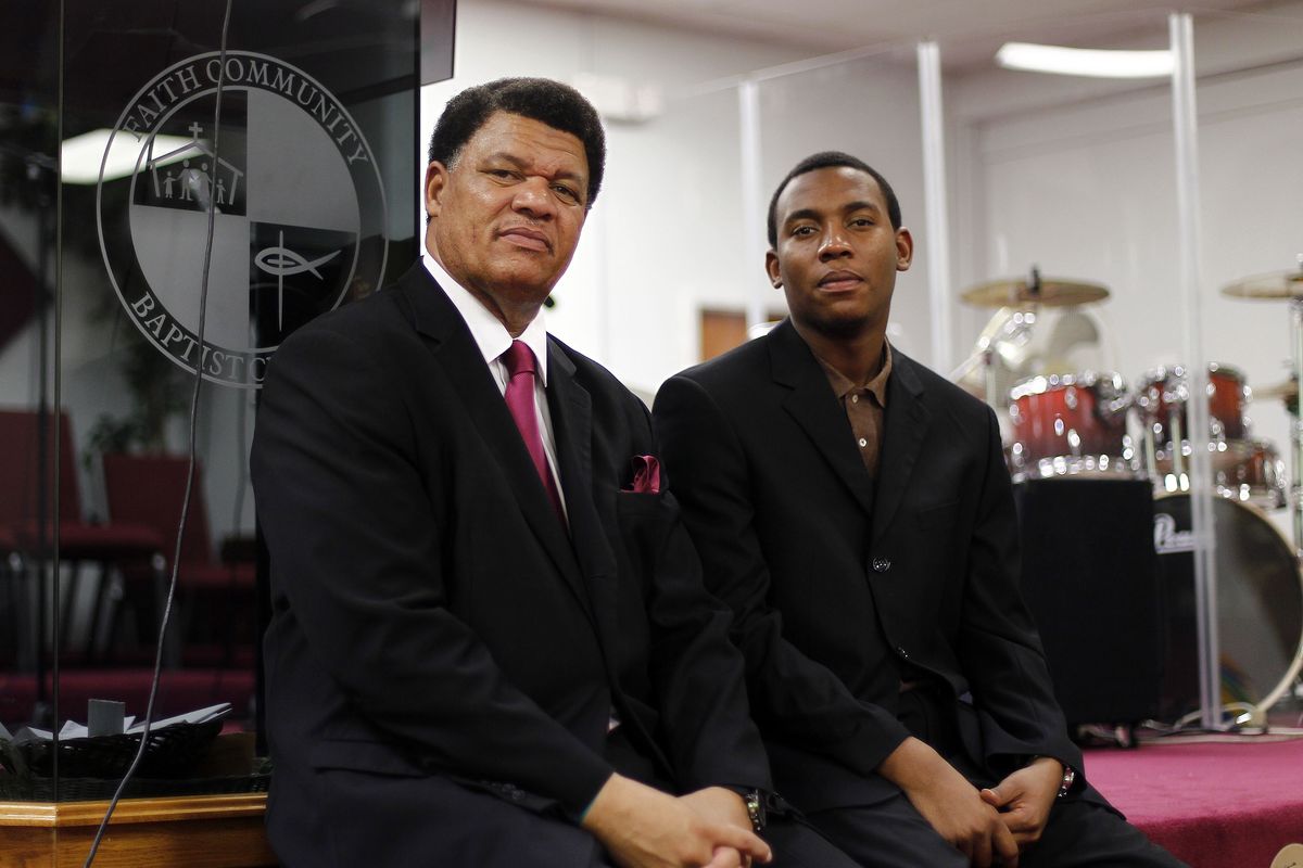 Rev. Richard Dunn, left, and his son, Rev. Richard Dunn III, are seen in Miami, Tuesday, Oct. 2, 2012, as they discuss their plans to motivate church members to vote in the upcoming elections. It's not just the collection plate that's getting passed around this fall at hundreds of mainly African-American and Latino churches in presidential battleground states and across the nation. Exhorting congregations to register to vote, church leaders are distributing registration cards in the middle of services, and many are pledging caravans of "souls to the polls" to deliver the vote. (J Carter / Associated Press)