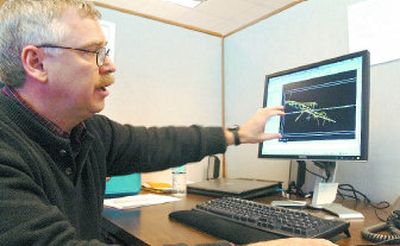 
Hecla mining engineer Art Smith displays a 3-D image of the Coeur d'Alene mining district in his office.
 (Jesse Tinsley / The Spokesman-Review)
