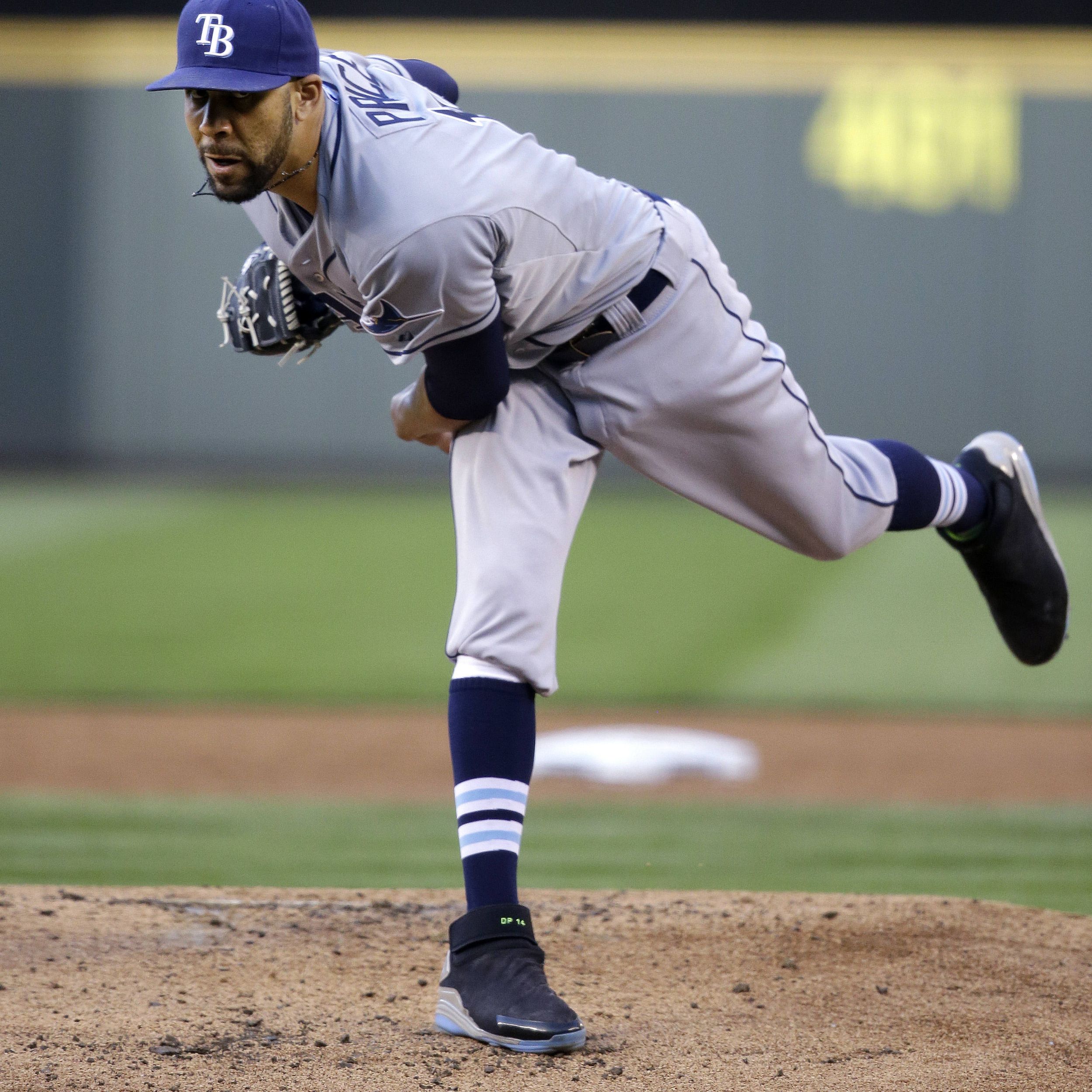 Rays rally by Yankees on James Loney's four RBI