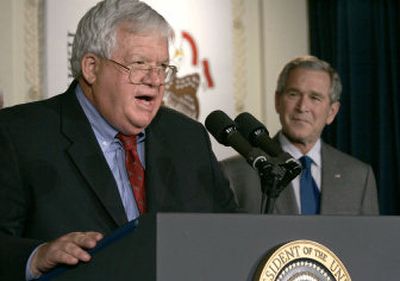 
Speaker of the House Dennis Hastert, R-Ill., left, introduces President Bush before a campaign fundraiser Thursday in Chicago. Bush said the nation would be 