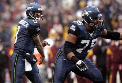 
Seattle quarterback Matt Hasselbeck, left, will have Sean Locklear protecting him again Sunday. 
 (Associated Press / The Spokesman-Review)
