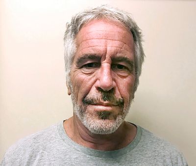 FILE – In this image provided by the New York State Sex Offender Registry, Jeffrey Epstein has his photo taken March 28, 2017. On Monday, Jan. 3, 2022, Judge Analisa Torres ordered charges dropped against two Bureau of Prisons guards who admitted falsifying records after Epstein’s suicide in jail. Prosecutors had said the guards, Tova Noel and Michael Thomas, shopped online and slept, and failed to make required rounds every 30 minutes.  (HOGP)