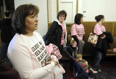 Supporters of Eileen Jensen, including her mother, Julie Jensen, left, gather Wednesday at the Spokane County Courthouse after Eileen Jensen was arraigned on a charge of vehicular homicide in the death of her 2-month-old daughter.   (Dan Pelle / The Spokesman-Review)