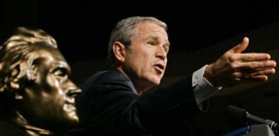 
Standing beside a bust of Thomas Jefferson, President Bush speaks Wednesday in Grapevine, Texas.
 (Associated Press / The Spokesman-Review)
