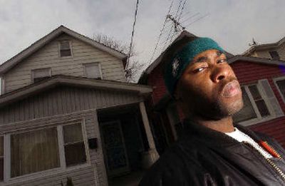 
Two Five, cousin of rap star 50 Cent, is photographed in front of his South Jamaica Queens home in New York.
 (Associated Press / The Spokesman-Review)
