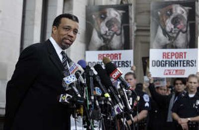 
Billy Martin, attorney for Michael Vick, speaks outside Federal Court after Vick's sentencing  on dogfighting charges Monday in Richmond, Va.Associated Press
 (Associated Press / The Spokesman-Review)