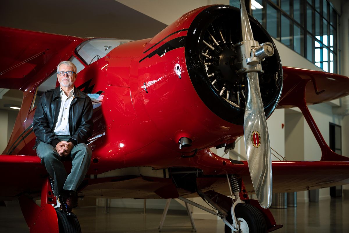 Johns Sessions, a Shadle Park graduate, created the Historic Flight Foundation  and is moving his museum with many of his vintage planes to a new hangar at Felts Field. Sessions is sitting on the wing of his Staggerwing Beechcraft Model D17s built in the 1930s. (Colin Mulvany / The Spokesman-Review)