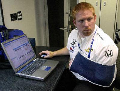 
Sheridan, who displays performance data from the team's car on a computer, is a 27-year old junior at IUPUI and is studying mechanical engineering technology with an emphasis on motorsports. He hopes to eventually become an engineer for a racing team. 
 (The Spokesman-Review)