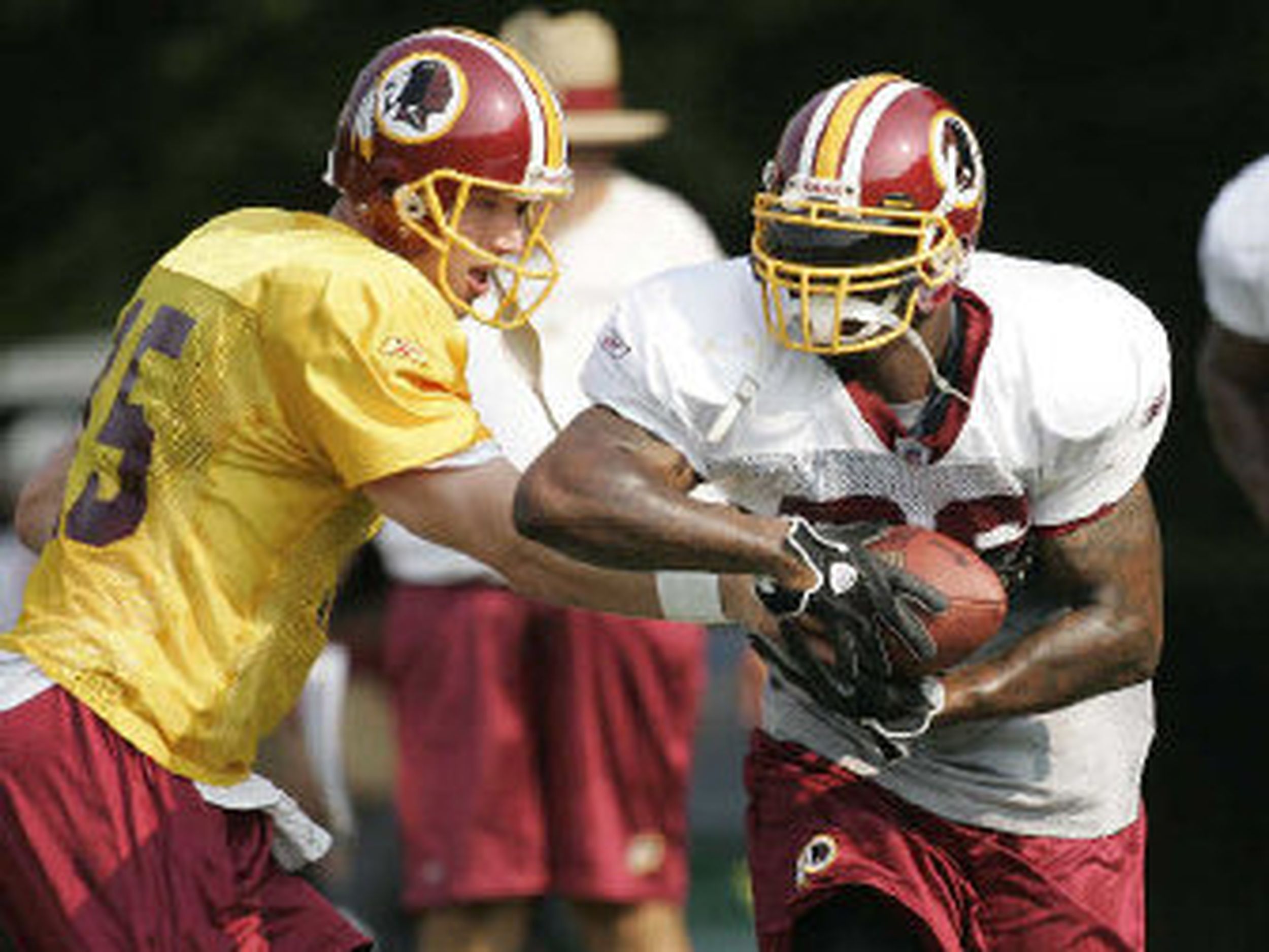 Washington Redskins' running back Clinton Portis rushes for a 1