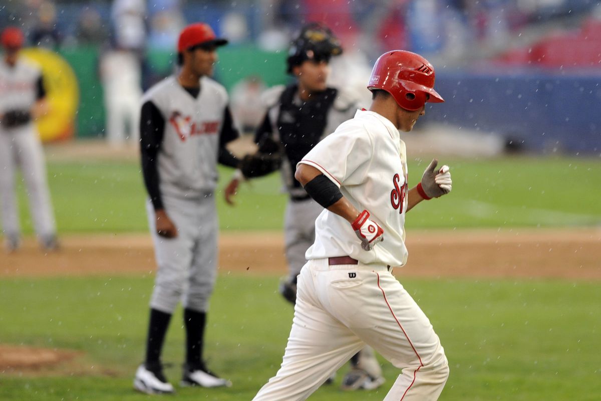 Jason Ogata rounds third after homering at Avista.  (Christopher Anderson / The Spokesman-Review)