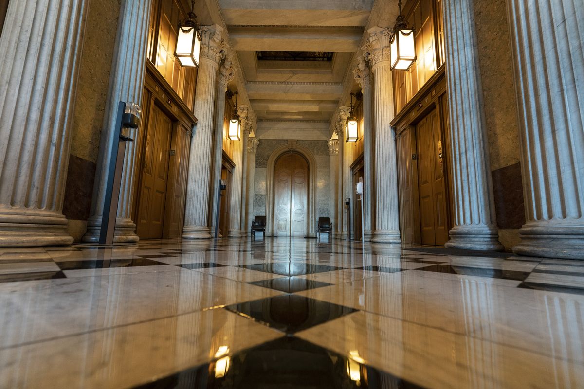 This June 30, 2021, photo shows the halls of the Capitol outside the Senate in Washington. The U.S. Capitol is still closed to most public visitors. It
