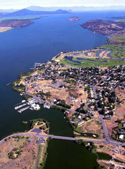 
Upper Klamath Lake and the closed headgate, bottom, part of the Klamath Basin, are shown in Klamath Falls, Ore., July 14, 2001. Associated Press
 (File Associated Press / The Spokesman-Review)