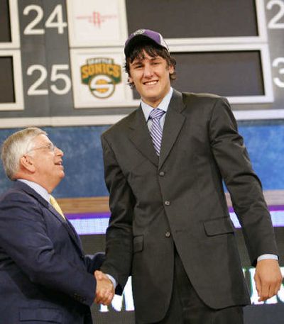 
Australian Andrew Bogut, a center from the University of Utah, is congratulated by NBA commissioner David Stern after being picked first in the draft.  
 (Associated Press / The Spokesman-Review)