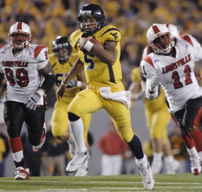 
West Virginia QB Pat White has rushed for more than 1,000 yards for the second straight year. Associated Press
 (Associated Press / The Spokesman-Review)