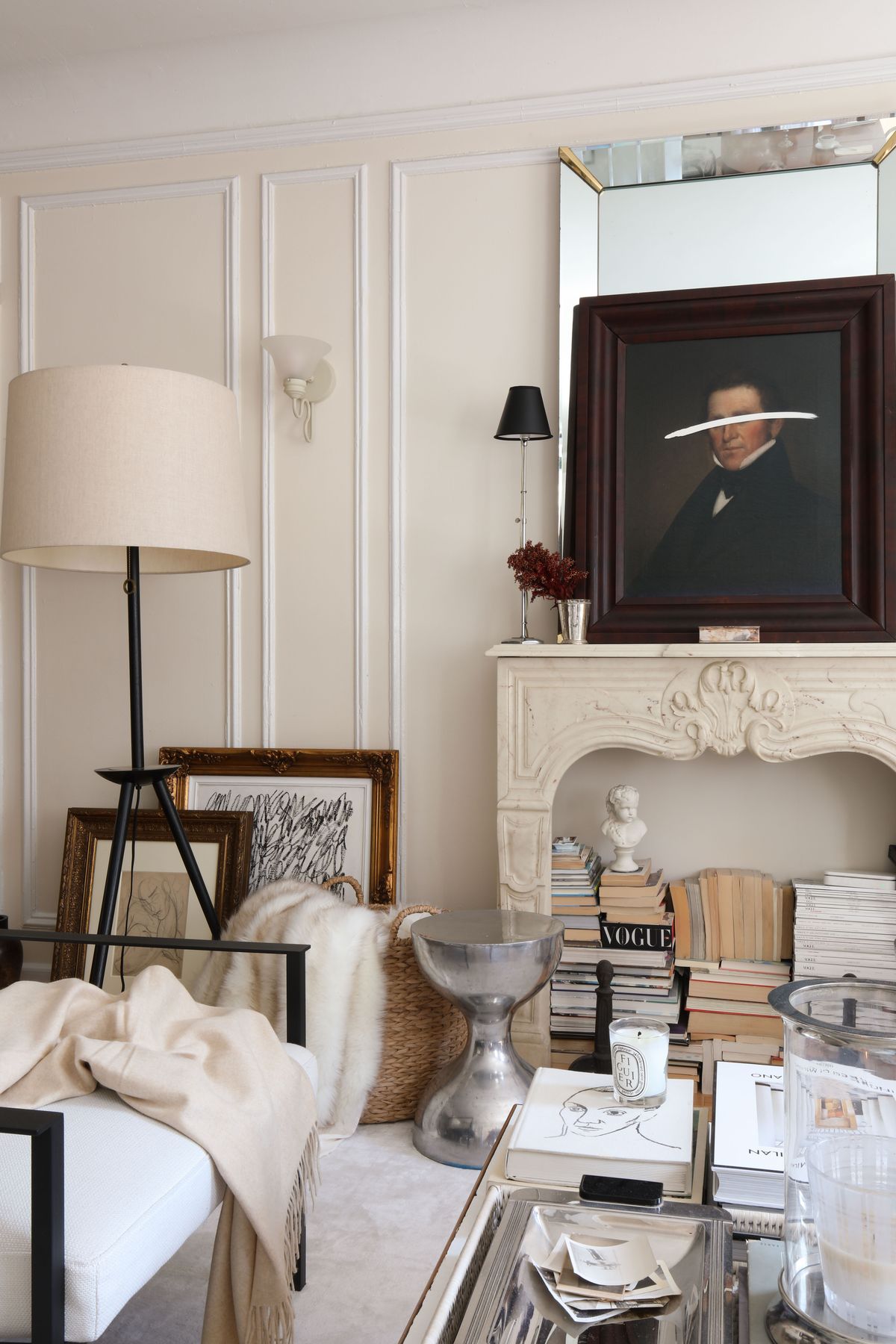 Artist and designer Josh Young styled a nonworking fireplace with books and more.  (Josh Young Design House)