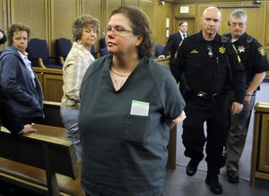 Shellye Stark leaves Spokane Superior Court on Thursday after being sentenced to almost 51 years for the murder of her husband, Dale Stark, in December 2007.  (Dan Pelle / The Spokesman-Review)