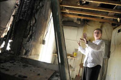 Owner Linda Zimmerman stands in what used to be the kitchen area of the Spangle Saloon. A fire destroyed the kitchen. Zimmerman hopes to be back in business by August. 
 (CHRISTOPHER ANDERSON / The Spokesman-Review)