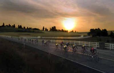
The Morning Ride cyclists head down into Hangman Valley at sunrise. 