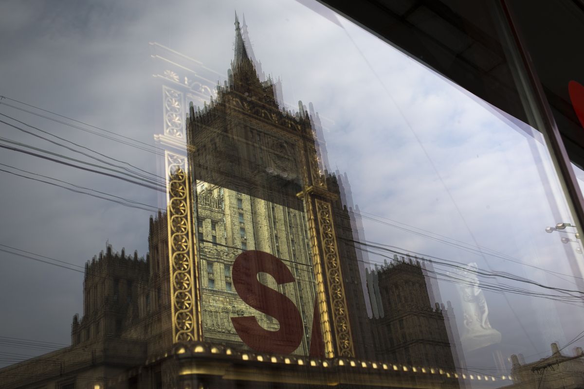 The Russian Foreign Ministry headquarters seen reflected in a shop window in Moscow on Thursday, Oct. 4, 2012.  US prosecutors allege that naturalized U.S. citizen  Alexander Fishenko and six others "engaged in a surreptitious and systematic conspiracy" to obtain highly regulated technology from U.S. makers and sold them to Russian authorities. Fishenko and six others charged in the alleged scheme are expected to appear Thursday morning in U.S. Houston federal court. (Alexander Zemlianichenko / Associated Press)