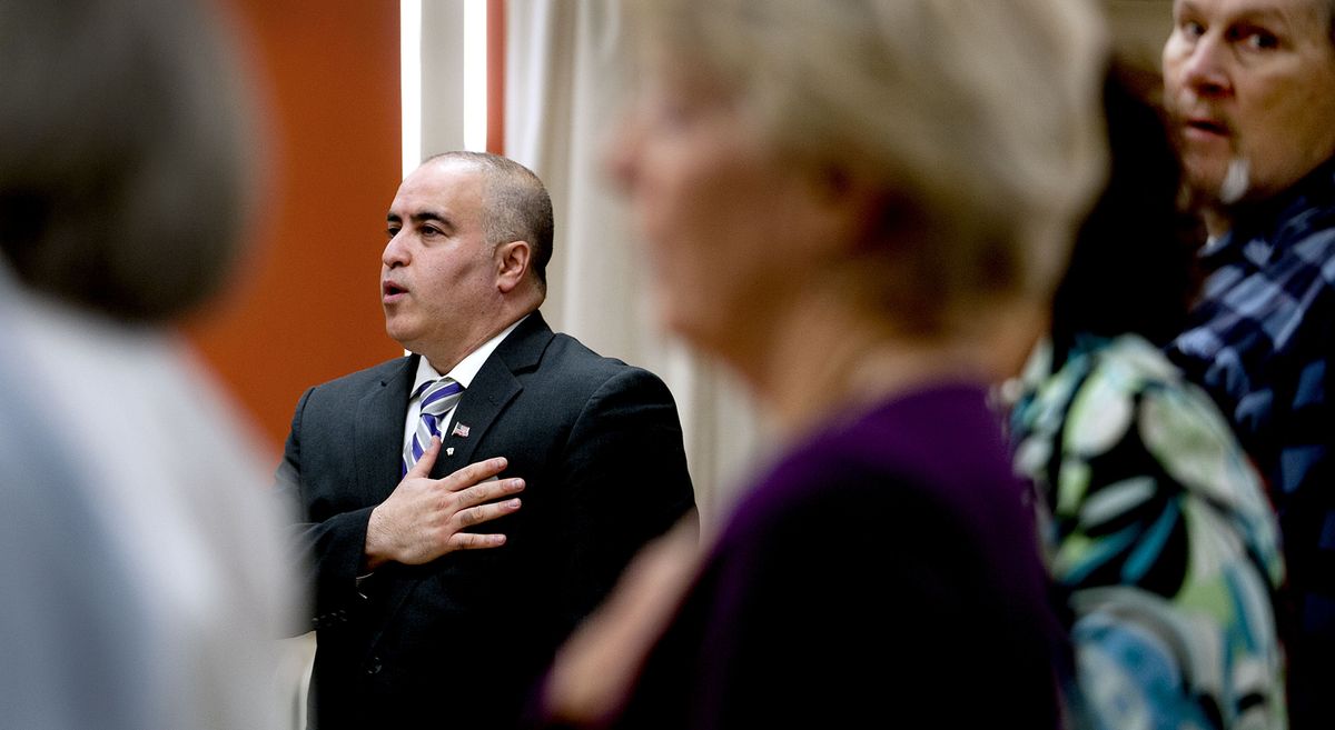 Anti-Islam pastor Shahram Hadian said the pledge of allegiance before addressing the crowd at Sandpoint Community Center in Sandpoint in April. (Kathy Plonka)