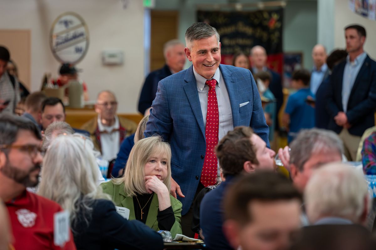 Michael Baumgartner, Washington’s 5th Congressional District representative, greets supporters during a campaign dinner event Monday at the Deutsches Haus. (COLIN MULVANY /THE SPOKESMAN-REVIEW)