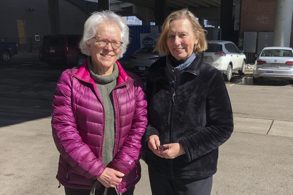 Linda Rosales, left, and Linda Dee pose for a photo after they carpooled to a campaign event with Sen. Amy Klobuchar, D-Minn., in Denver on March 2, 2020, only to find she had ended her presidential bid. The two had hoped to back a woman but are accepting the Democratic race will come down to two white men. (Nicholas Riccardi / Associated Press)