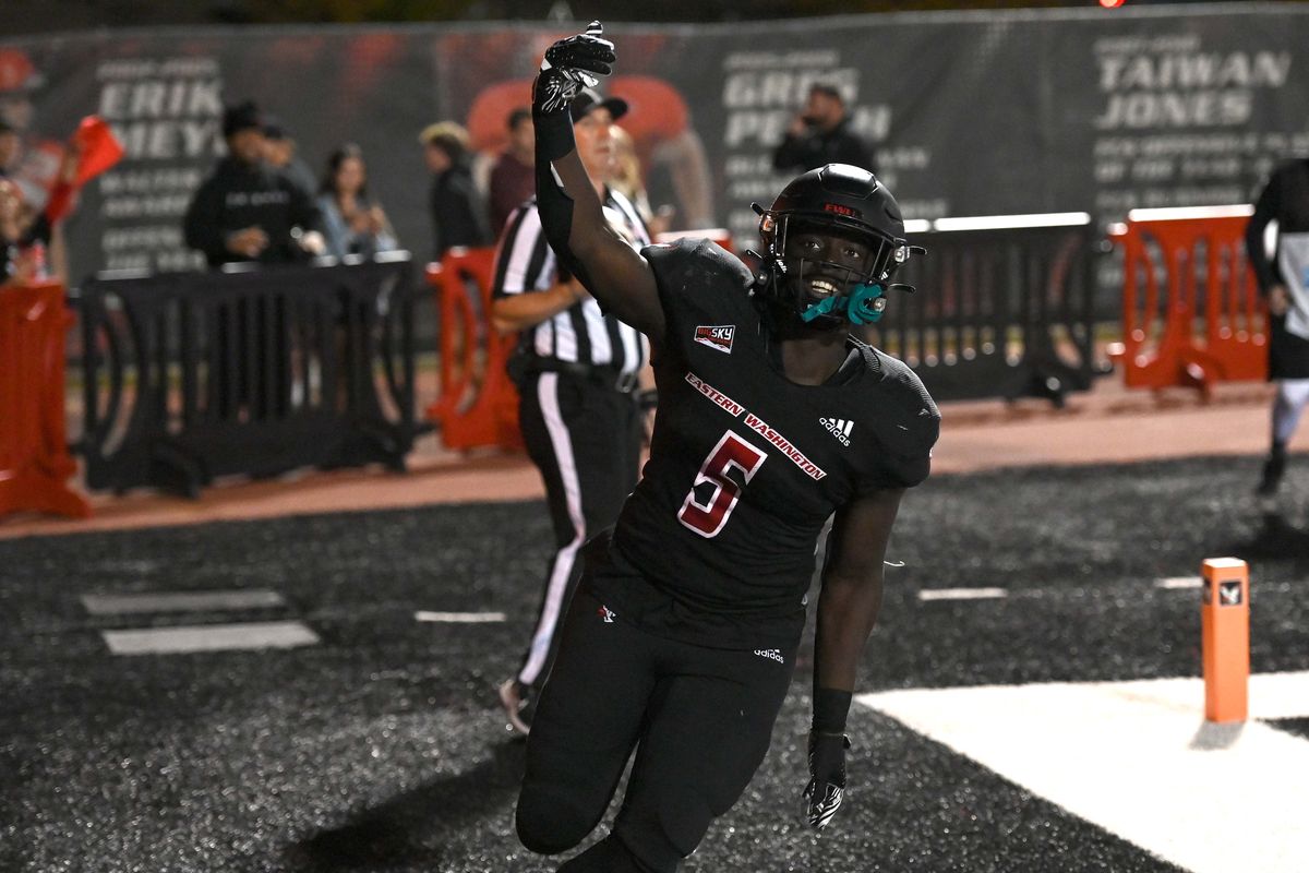 EWU running back Tuna Altahir celebrates a touchdown against Weber State on Saturday. (James Snook/THE SPOKESMAN-REVIEW)