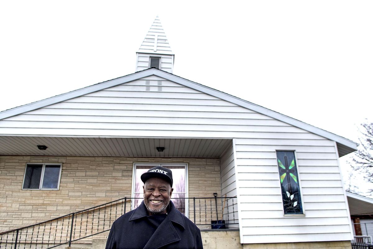The Rev. Percy “Happy” Watkins talks about the relocation of New Hope Baptist Church outside its future home, the former site of Valley Landmark Missionary Baptist Church in Spokane Valley, on Friday, March 3, 2017. (Kathy Plonka / The Spokesman-Review)