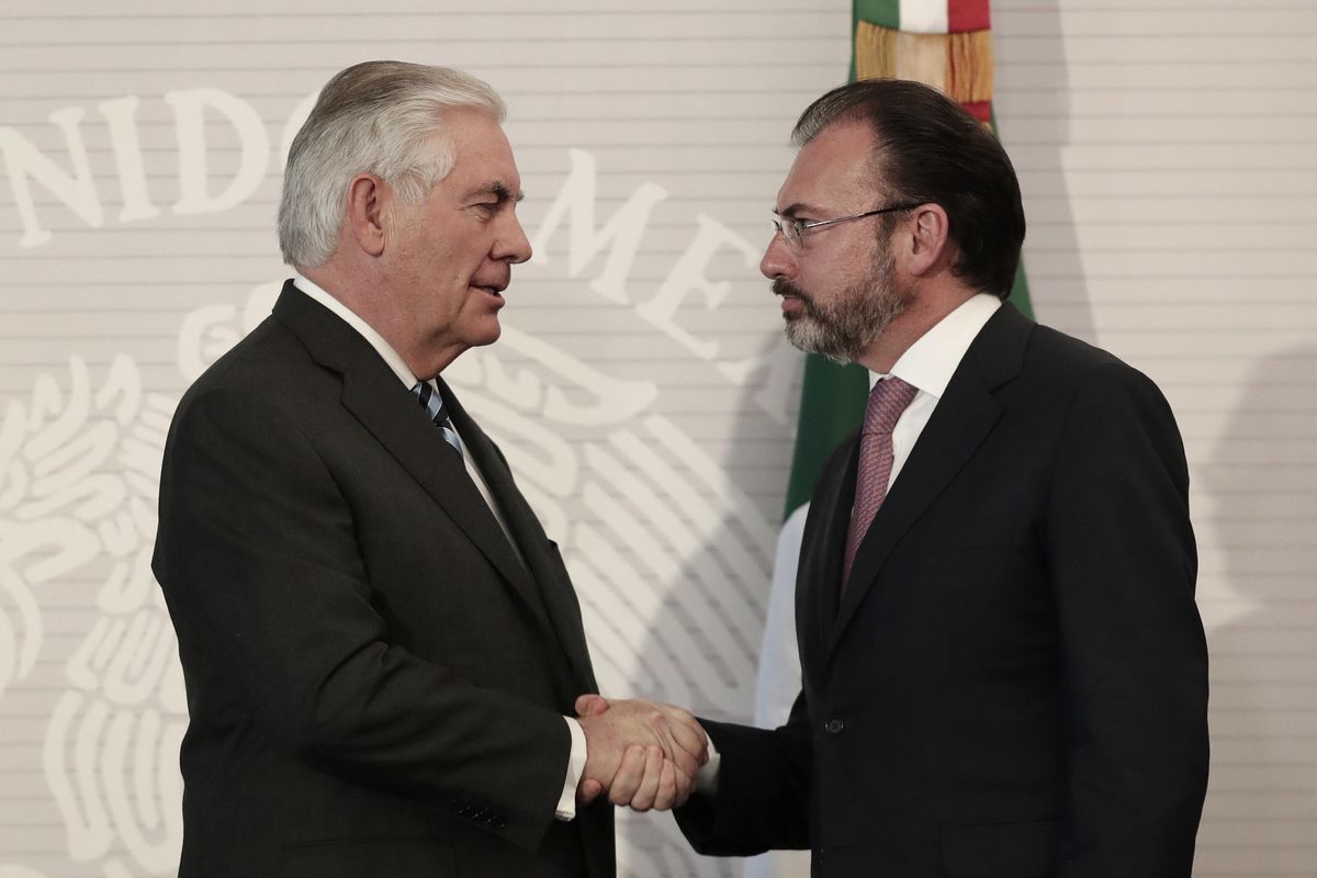 U.S. Secretary of State Rex Tillerson, left, shakes hands with Mexico