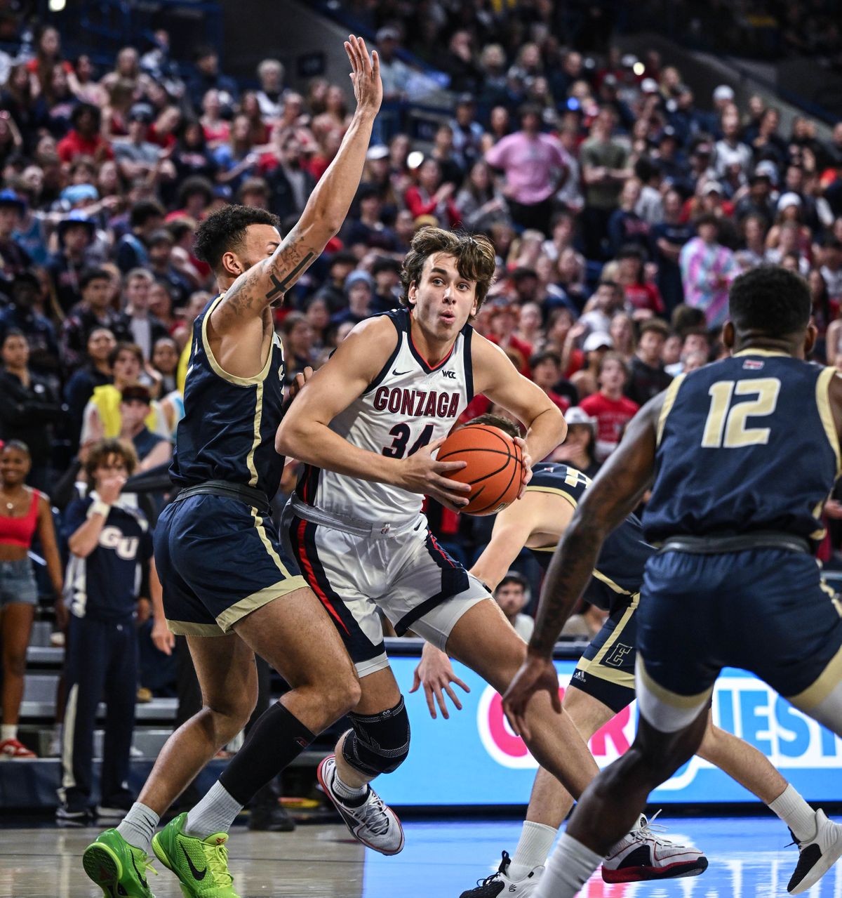 Gonzaga forward Braden Huff, who scored 23 points, makes a move against Eastern Oregon’s Brennen Newsom during the first half Tuesday.  (By Colin Mulvany/The Spokesman-Review)