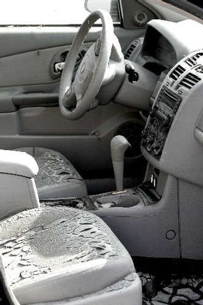 
The flood-damaged interior of a new auto is shown on a dealership lot in New Orleans. 
 (Associated Press / The Spokesman-Review)