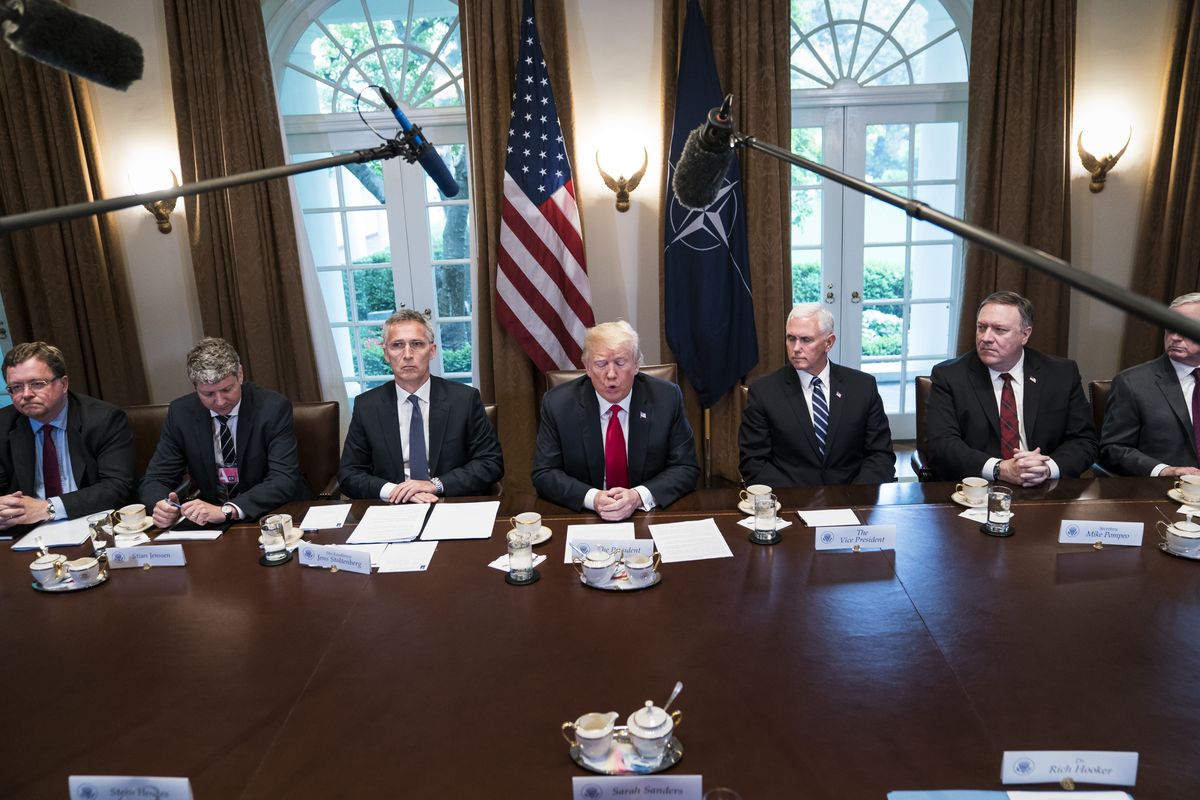 Trump, center, speaks with NATO Secretary General Jens Stoltenberg, left, during a meeting in the Cabinet Room at the White House on May 17, 2018 in Washington.    (Jabin Botsford/The Washington Post)
