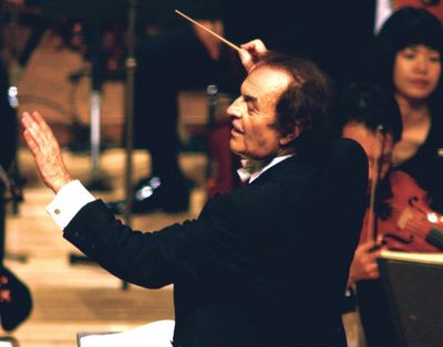 Conductor Charles Dutoit performs with NHK Symphony Orchestra on June 19, 2003 in Tokyo, Japan. (Associated Press)