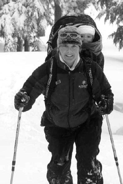 
Maureen Prokopiw snowshoes with her one-year-old son on her back on the East Ridge Nature Trail at Silver Mountain last month. 