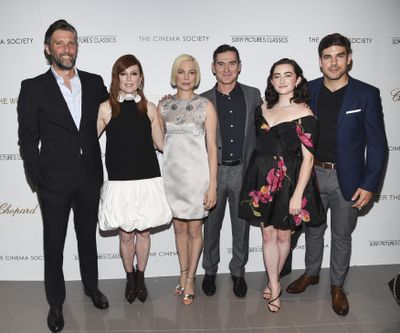 Director Bart Freundlich, Julianne Moore, Michelle Williams, Billy Crudup, Abby Quinn and Alex Esola attend a screening of their new film “After the Wedding” at Regal Essex on Aug. 6 in New York. (Evan Agostini / Invision/AP)