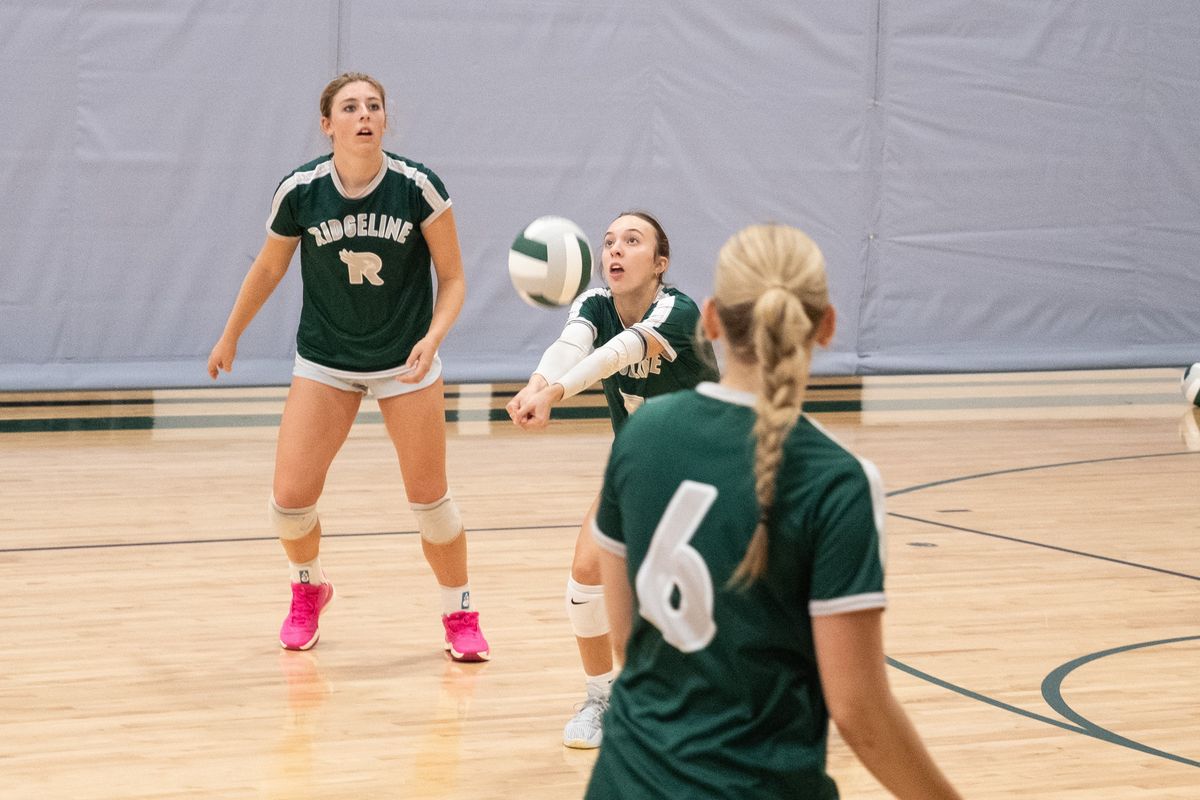Senior libero Makayla Hickman returns a serve during an Aug. 30 practice at Ridgeline High School in Liberty Lake.  (Madison McCord/For The Spokesman-Review)