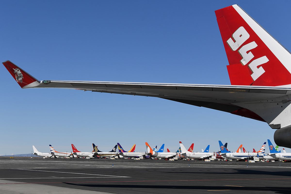 A Global Supertanker awaits media during a wildfire response demonstration hosted by AreoTEC on Tuesday, March 23, 2021, at Grant County International Airport in Moses Lake, Wash. The Global Supertanker is the worlds largest firefighting air tanker with the capability to drop more than 19,000 gallons of fire retardant or water. Washington DNR is hoping to call on the Global Supertanker if needed during the 2021 wildfire season.  (Tyler Tjomsland/The Spokesman-Review)