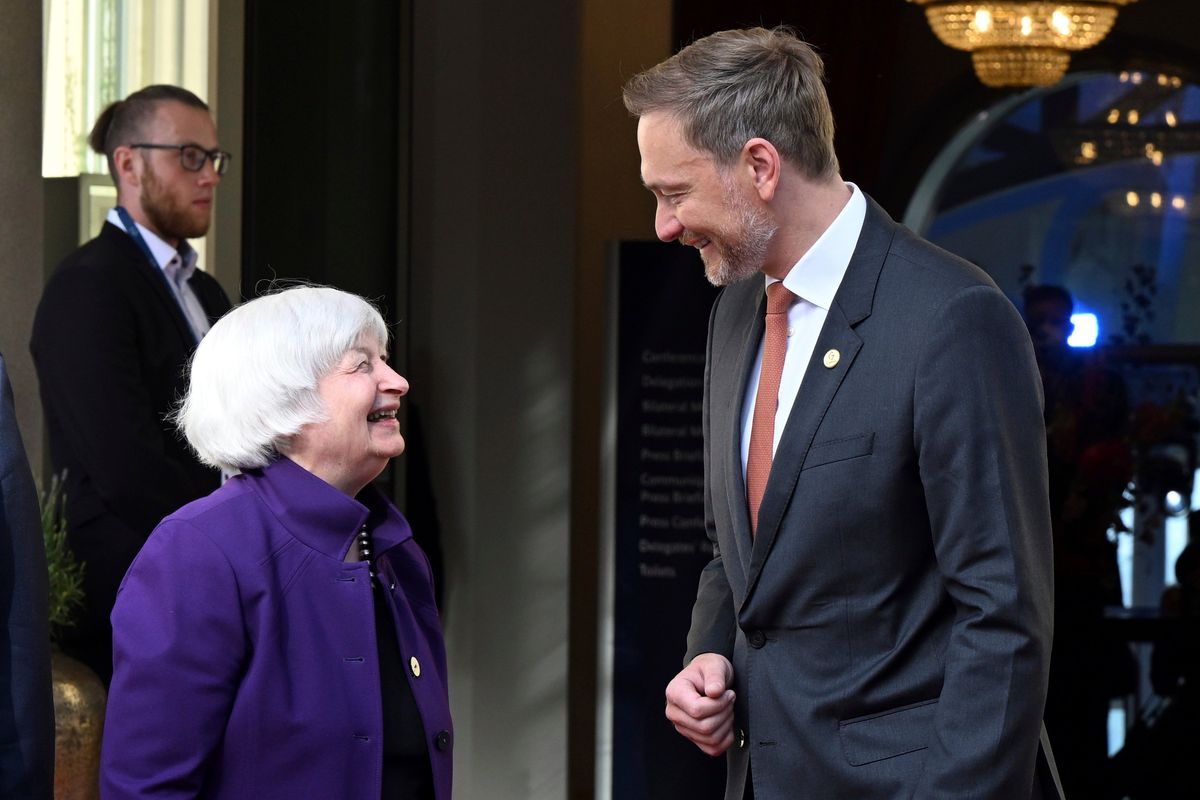 German Finance Minister Christian Lindner, right, welcomes U.S. Treasury Secretary Janet Yellen, front left, for a G-7 Finance Ministers Meeting on Thursday at the federal guest house in Petersberg, near Bonn, Germany.  (Federico Gambarini)